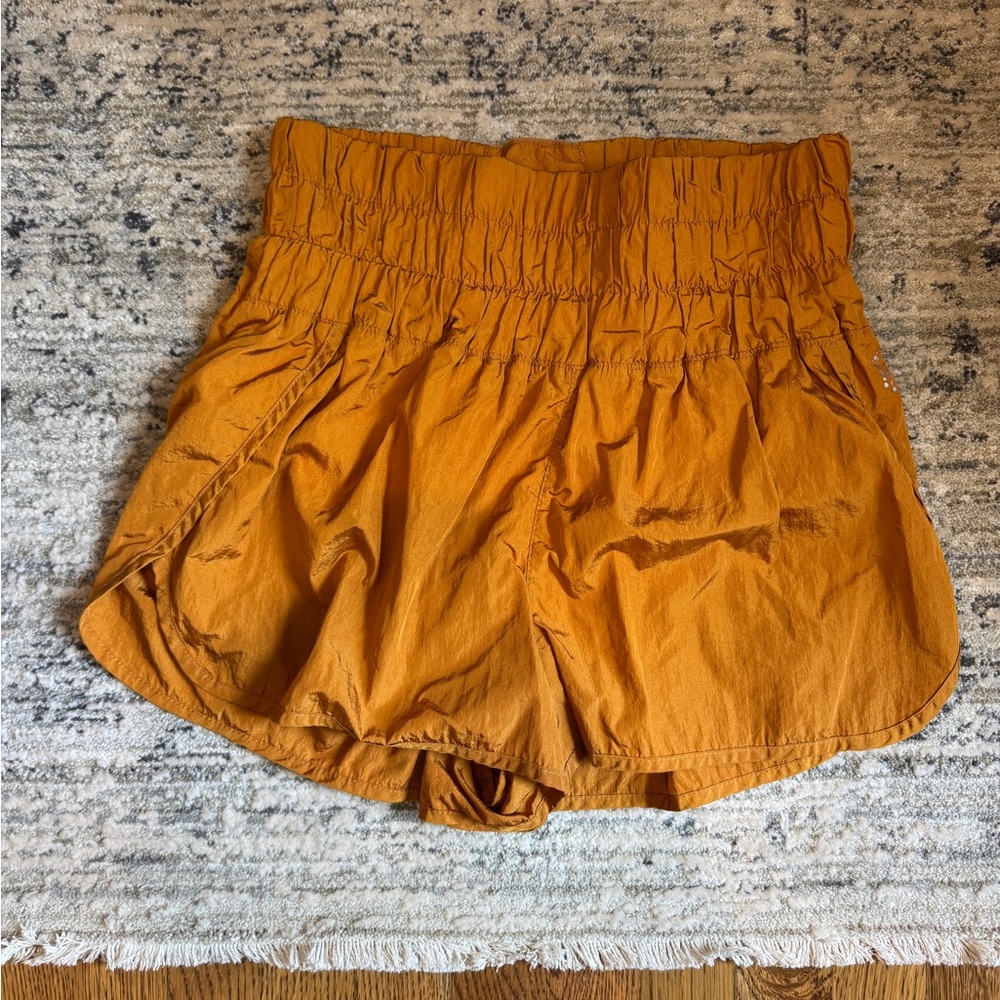 Free people movement gold high waisted shorts
